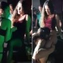 Shy girl surprised by female stripper